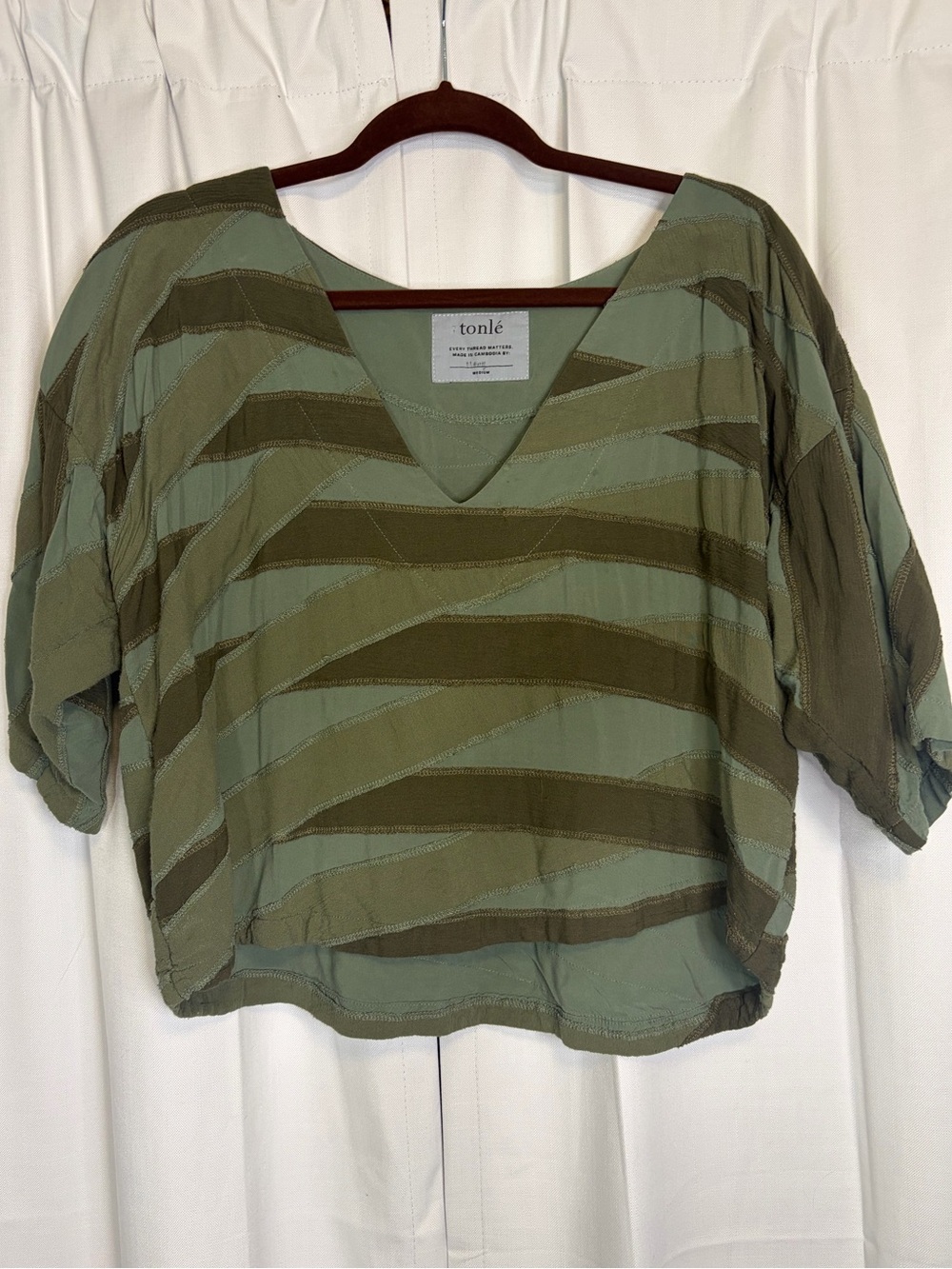 Tonle Green Patchwork V Neck Dolman Blouse. Size Medium. Retail $120